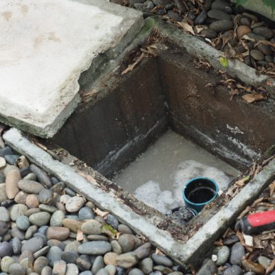 drain-cleaning-plumber-repairing-clogged-grease-trap-with-auger-machine-maintenance-sewage-system-grease-trap-by-professional-plumber-using-auger-snake-fix-unclog-drain drain-cleaning-plumber-repairing-clogged-grease-trap-with-auger-machine-maintenance-sewage-system-grease-trap-by-professional-plumber-using-auger-snake-fix-unclog-drain